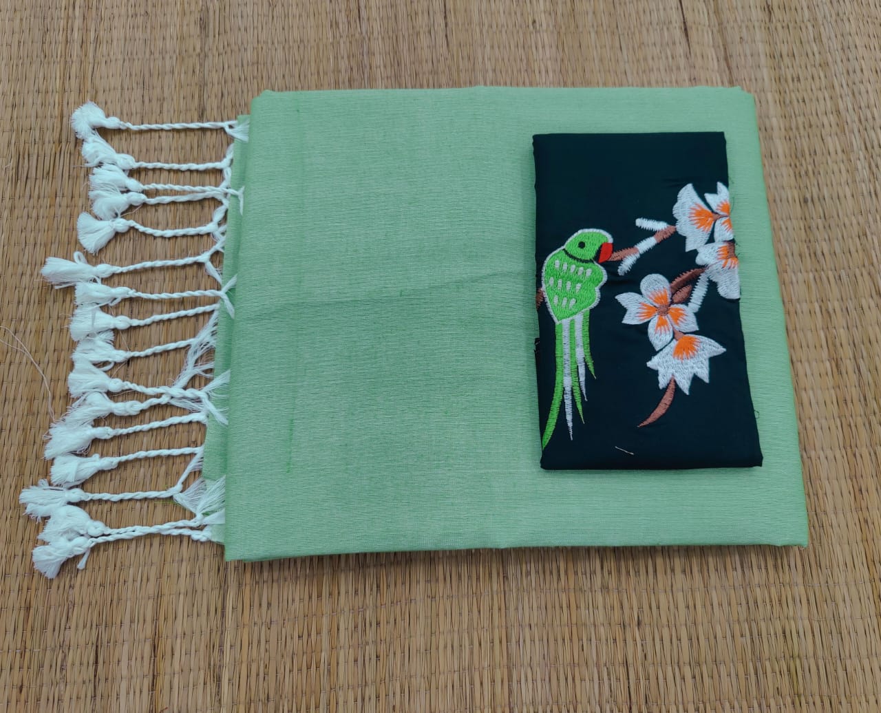Plain cotton saree with embroidered blouse piece