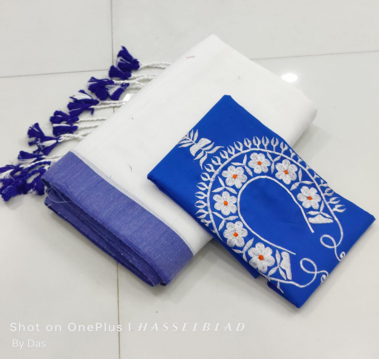 Plain cotton saree with embroidered blouse piece